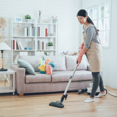 A-happy-person-using-a-vacuum-cleaner